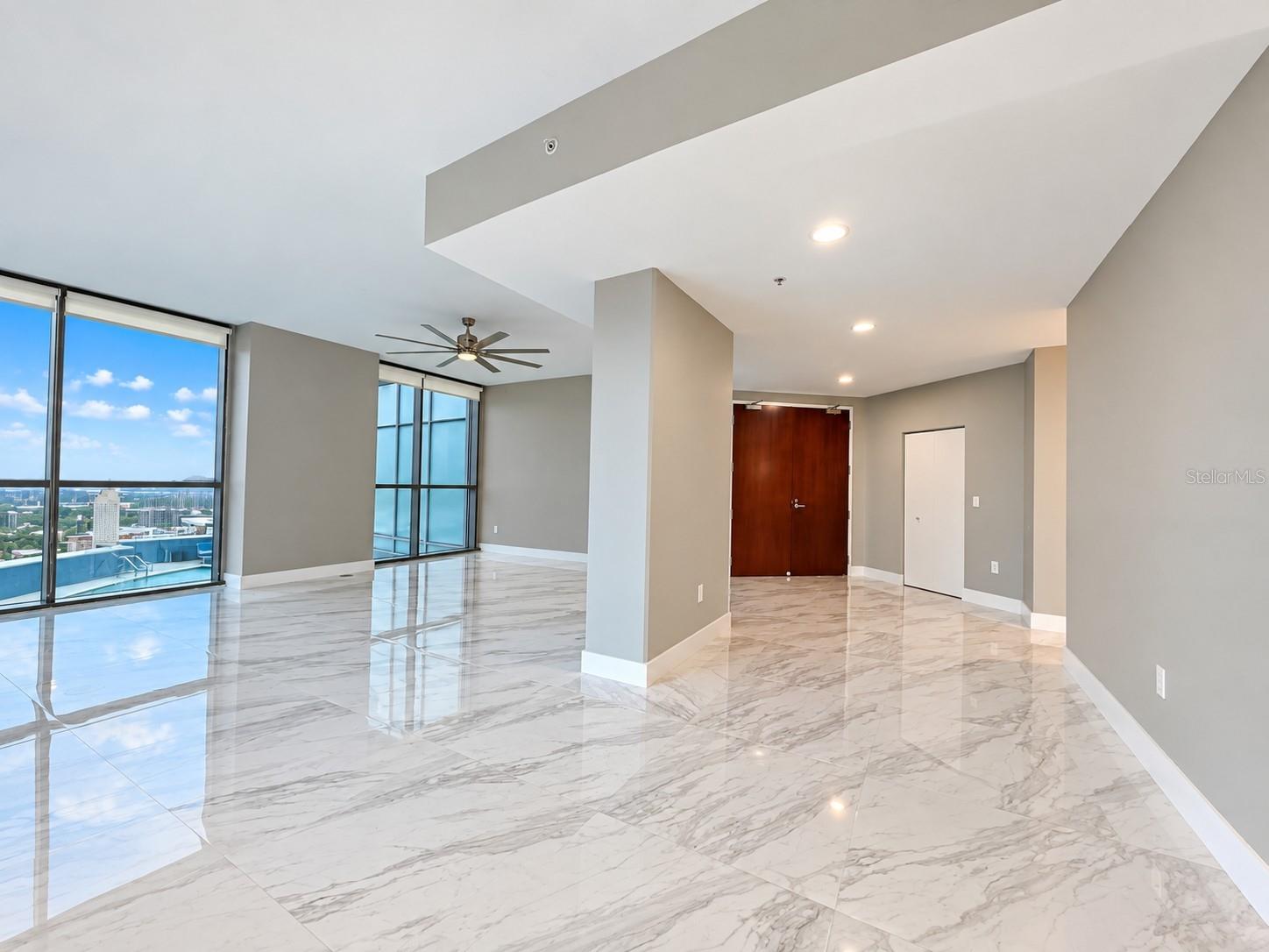 Living room with large format tile in Aspire penthouse
